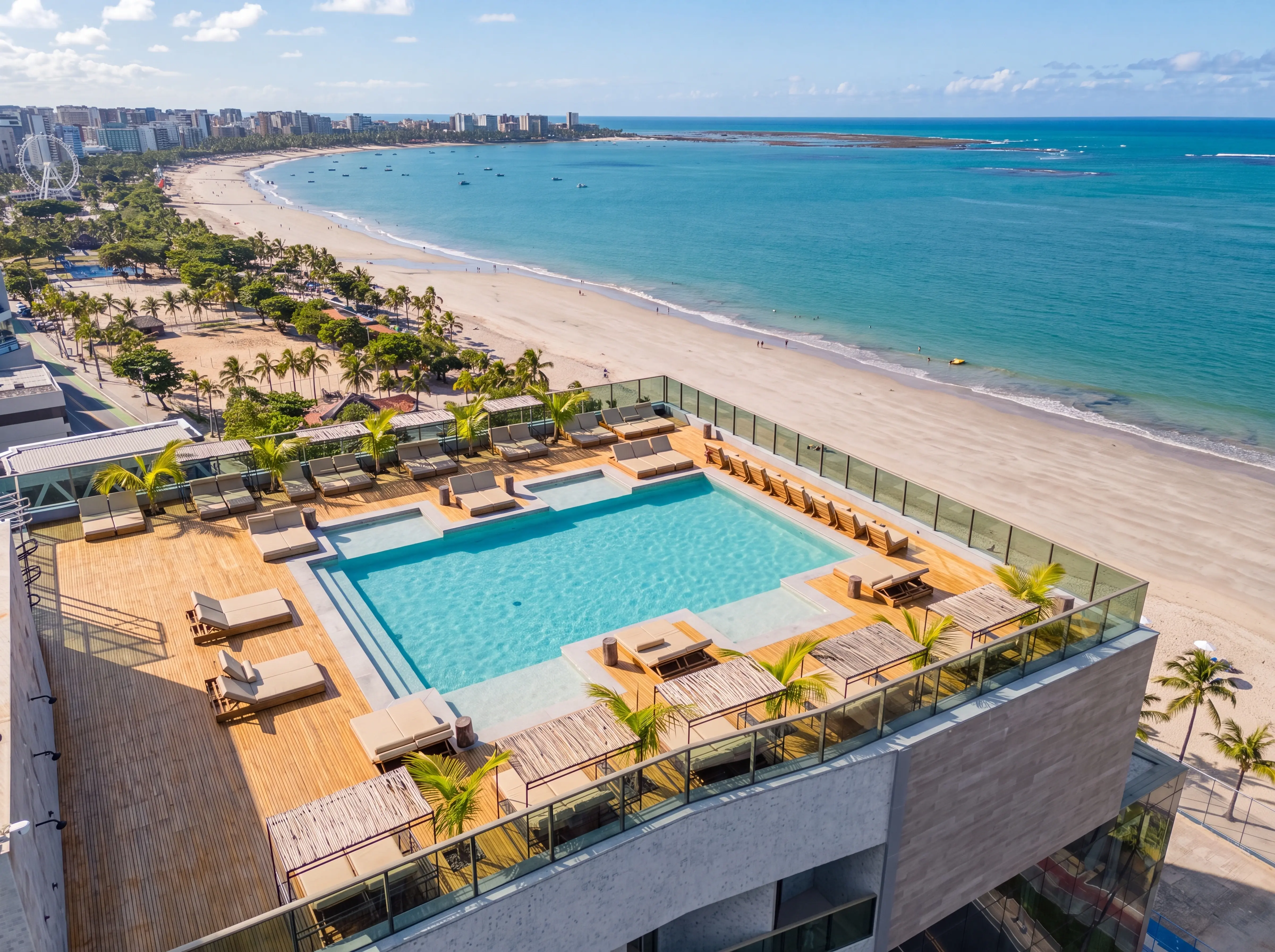 Piscina do rooftop do Sais Beach Living ao pôr do sol praia de pajuçara
